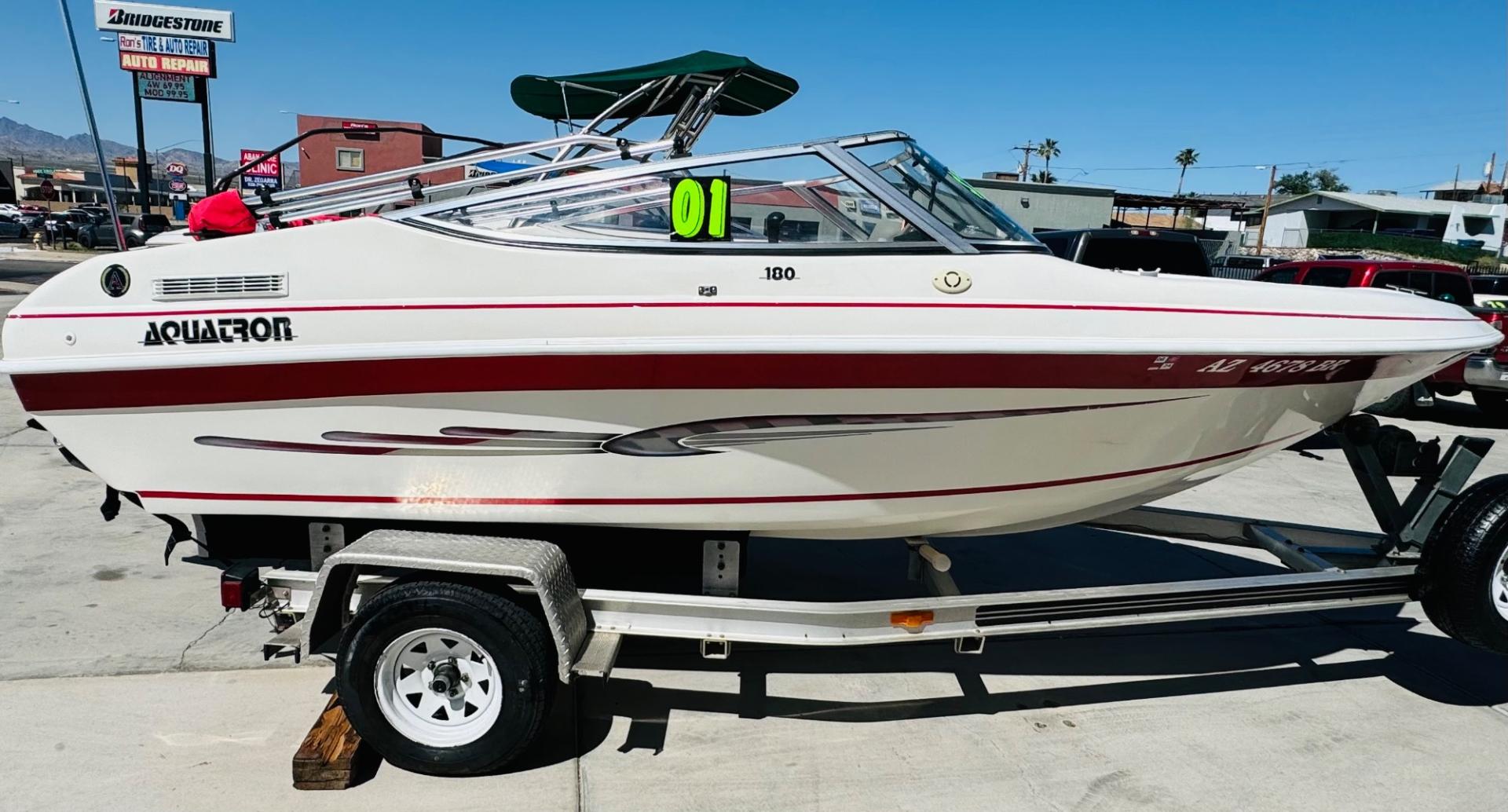 2001 White /white/red Aquatron 180 , located at 2190 Hwy 95, Bullhead City, AZ, 86442, (928) 704-0060, 0.000000, 0.000000 - On consignment this 2001 Aquatron 180. 3.0 engine. 18ft in length. nice bimini top . interior has some damage. price reduced. Runs great. - Photo#2